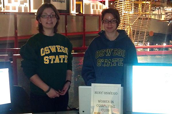 Two students in the women in computing club