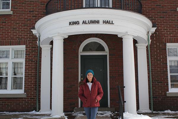 Susan standing in front of king hall