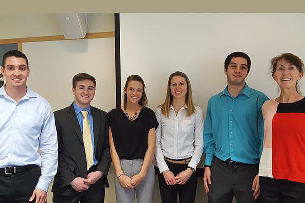 student investment club students with Mary Rodgers