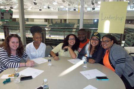 Students sitting around table