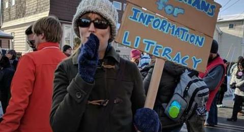 Librarians supporting libraries protest