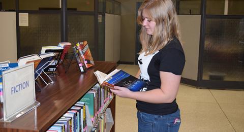 Student browsing for reading materials.