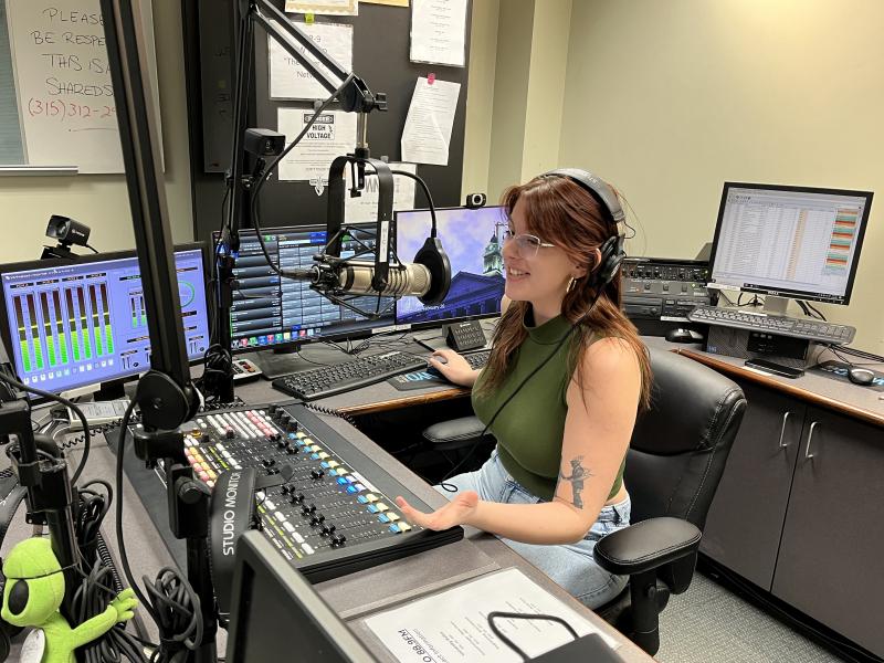 Raina Horitz works in the WNYO radio studio