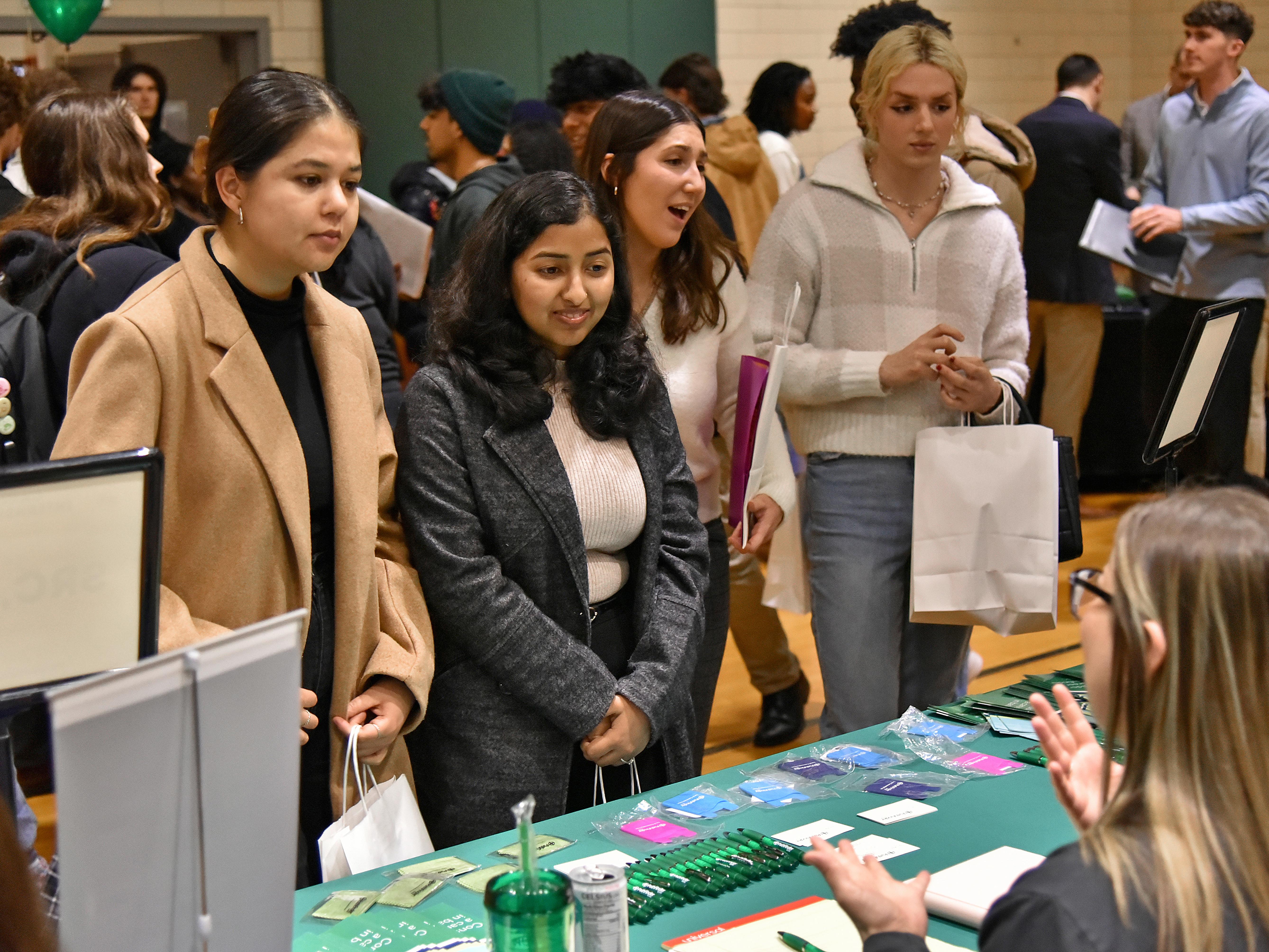 Students speak to employers at the 2024 spring career fair