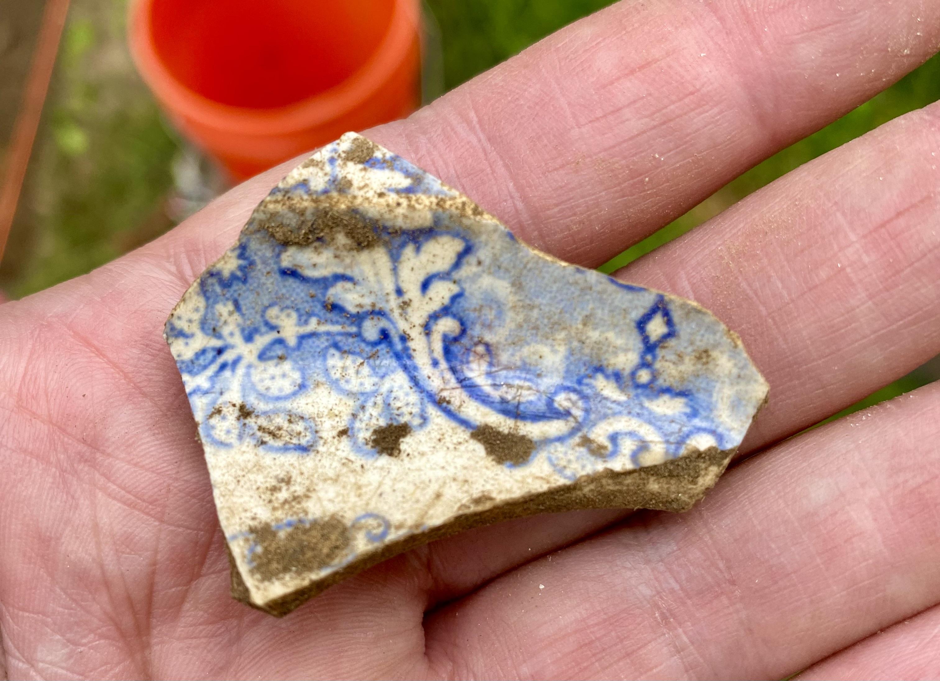 Shard of 19th century ceramic from the archaeological dig.