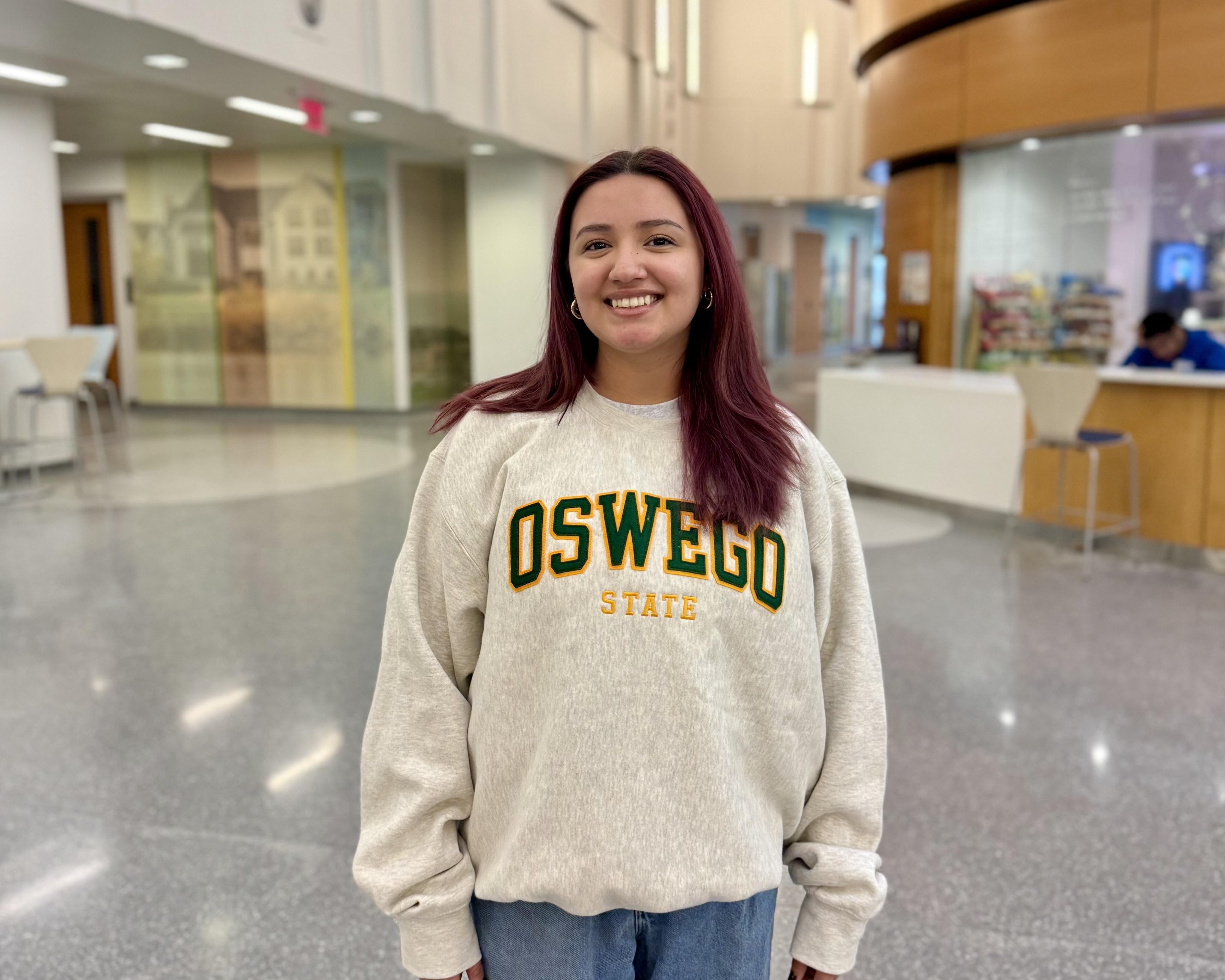 Oswego senior Tanya Hernandez stands in Shineman Center.