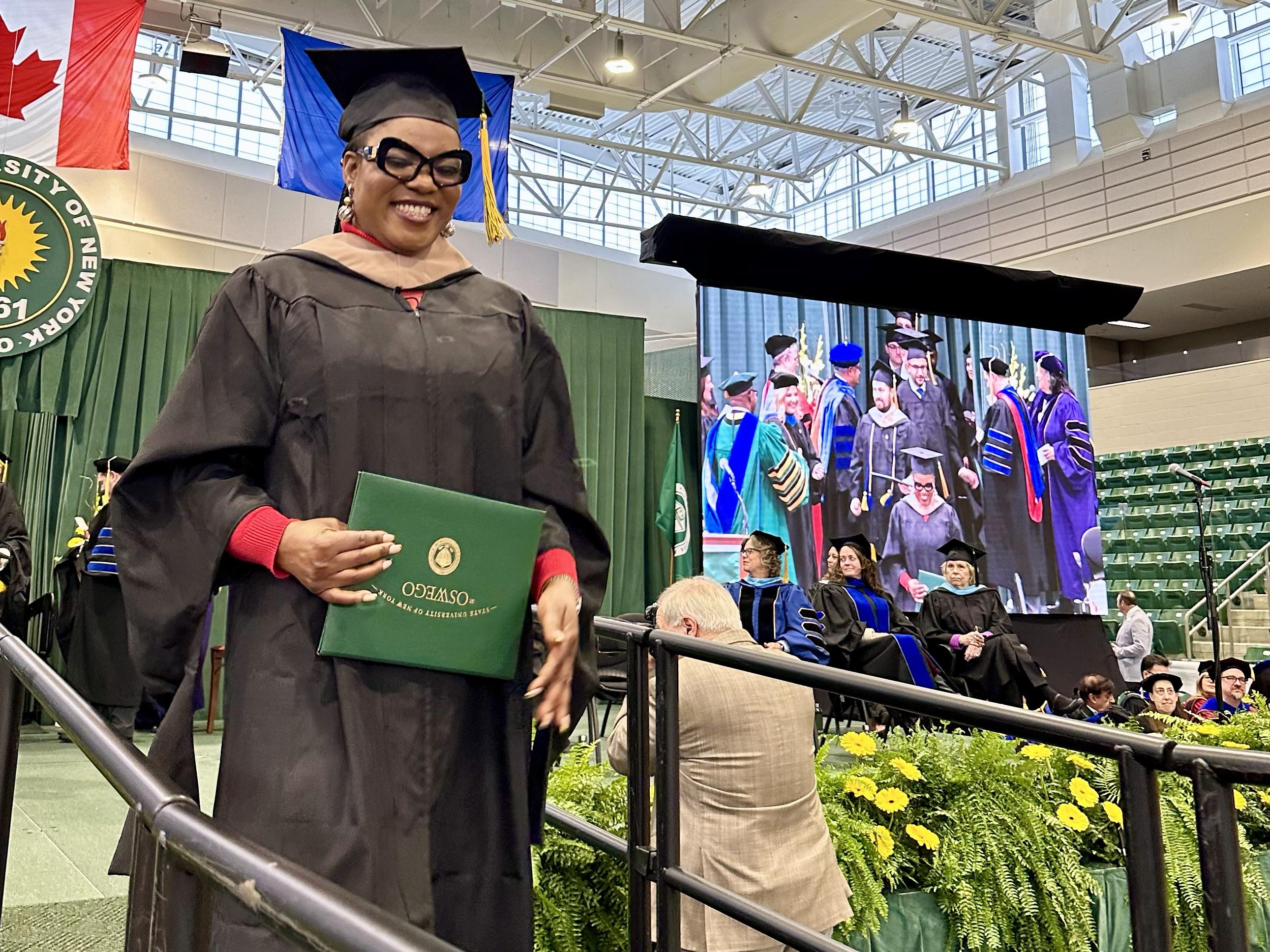 Jane Nwagu walks the ramp at Commencement