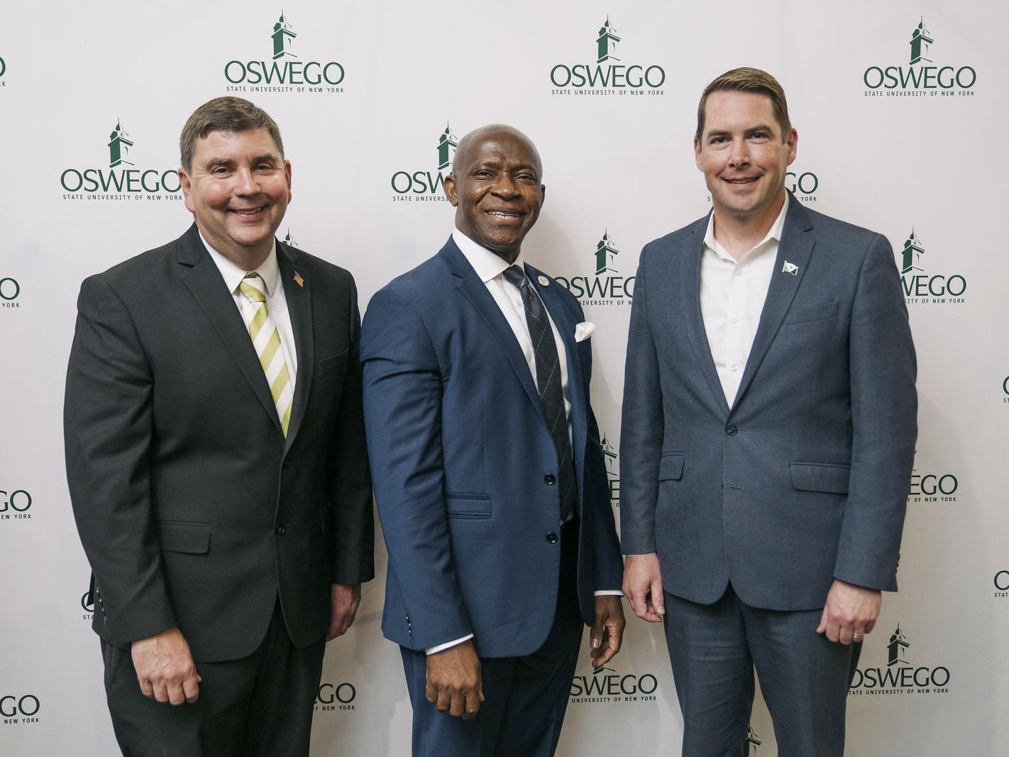 NYS Senator John Mannion, SUNY Oswego President Peter O. Nwosu and Syracuse Mayor Ben Walsh at the community reception at SUNY Oswego's Syracuse Campus.