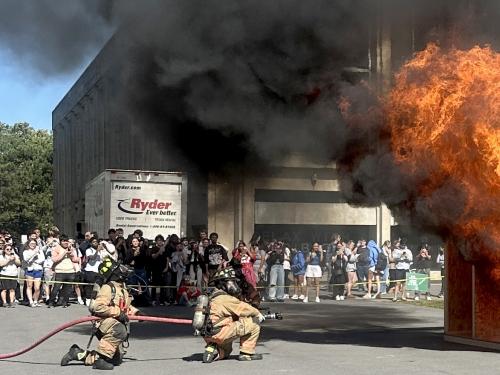 Changes in operations, training and education -- such as this Fire Safety Month activity where firefighters battled a mock blaze on Oct. 1 -- have led to a large reduction in fire calls impacting local agencies