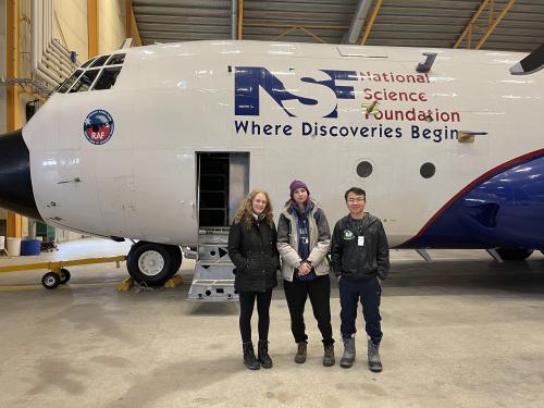 Oswego students Sarah Gryskewicz and Bee Lamsma and Dr. Yonggang Wang in front of the NCAR C-130 research aircraft.