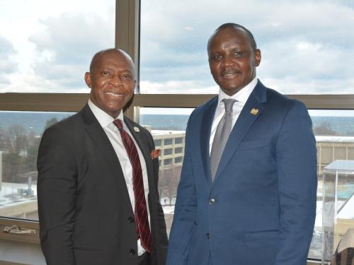 SUNY Oswego President Peter O. Nwosu (left) welcomes Kenyan Ambassador to the United Nations Erastus Ekitela Lokaale during a campus visit  in December 2024