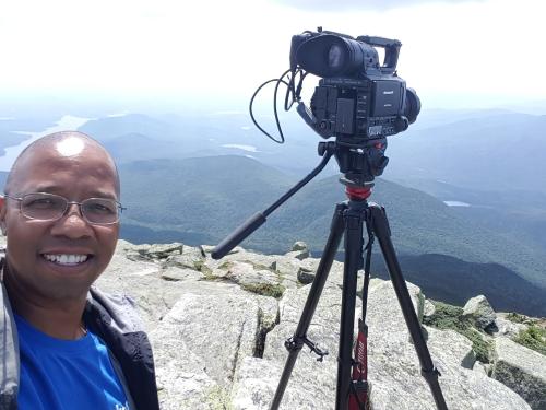 Director Paul A. Miller filming "Searching for Timbuctoo" in the Adirondacks