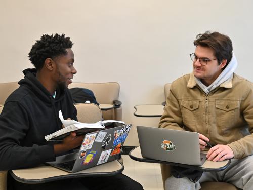 From left, senior broadcasting major Nacir Meikle and junior communication major Holden Reynolds are two of the students in communication studies faculty member Eileen Gilligan's "Community Journalism" class