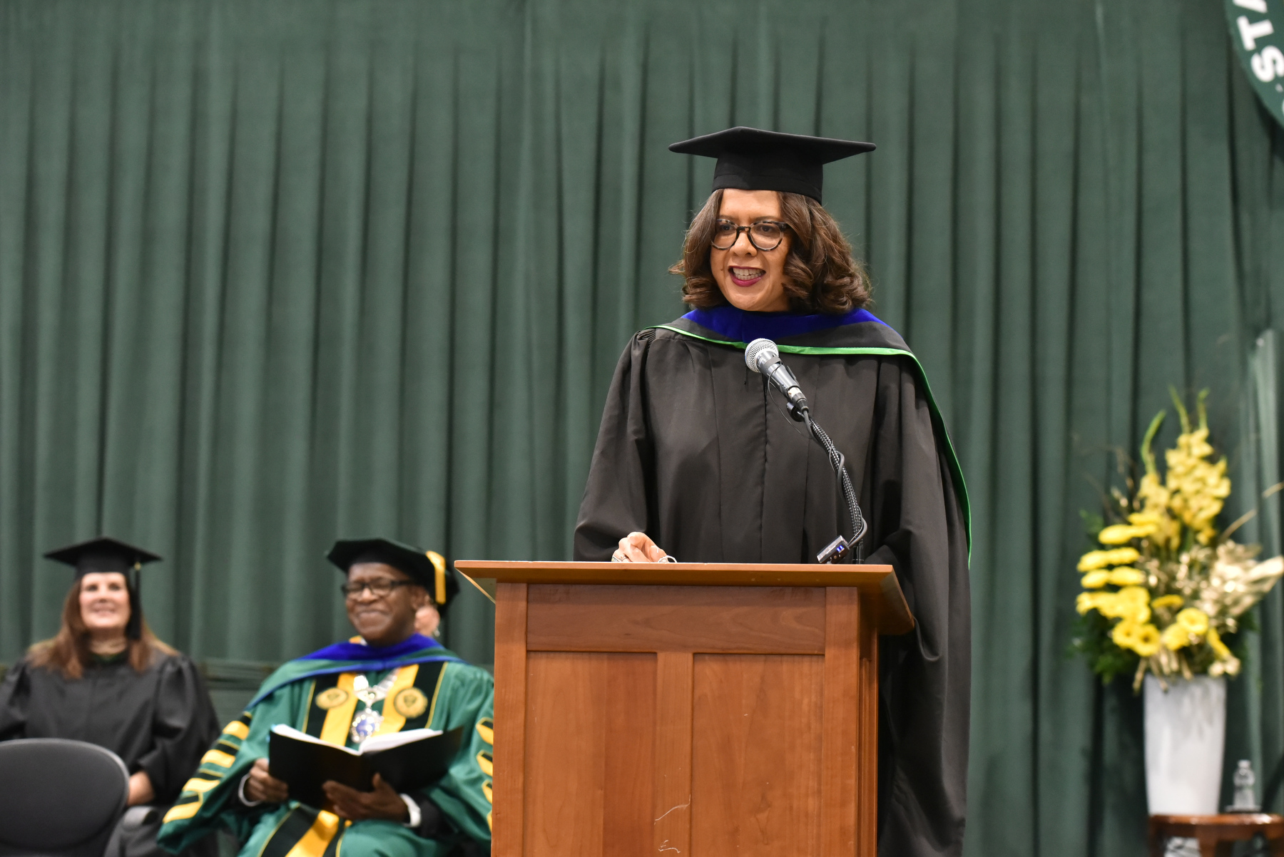 Trudy Perkins ’93, retired chief of staff and communications director for U.S. Sen. Sherrod Brown, received an honorary doctorate in humane letters from SUNY for outstanding public service, and served as Commencement speaker for the 9 a.m. ceremony for the College of Liberal Arts and Sciences.