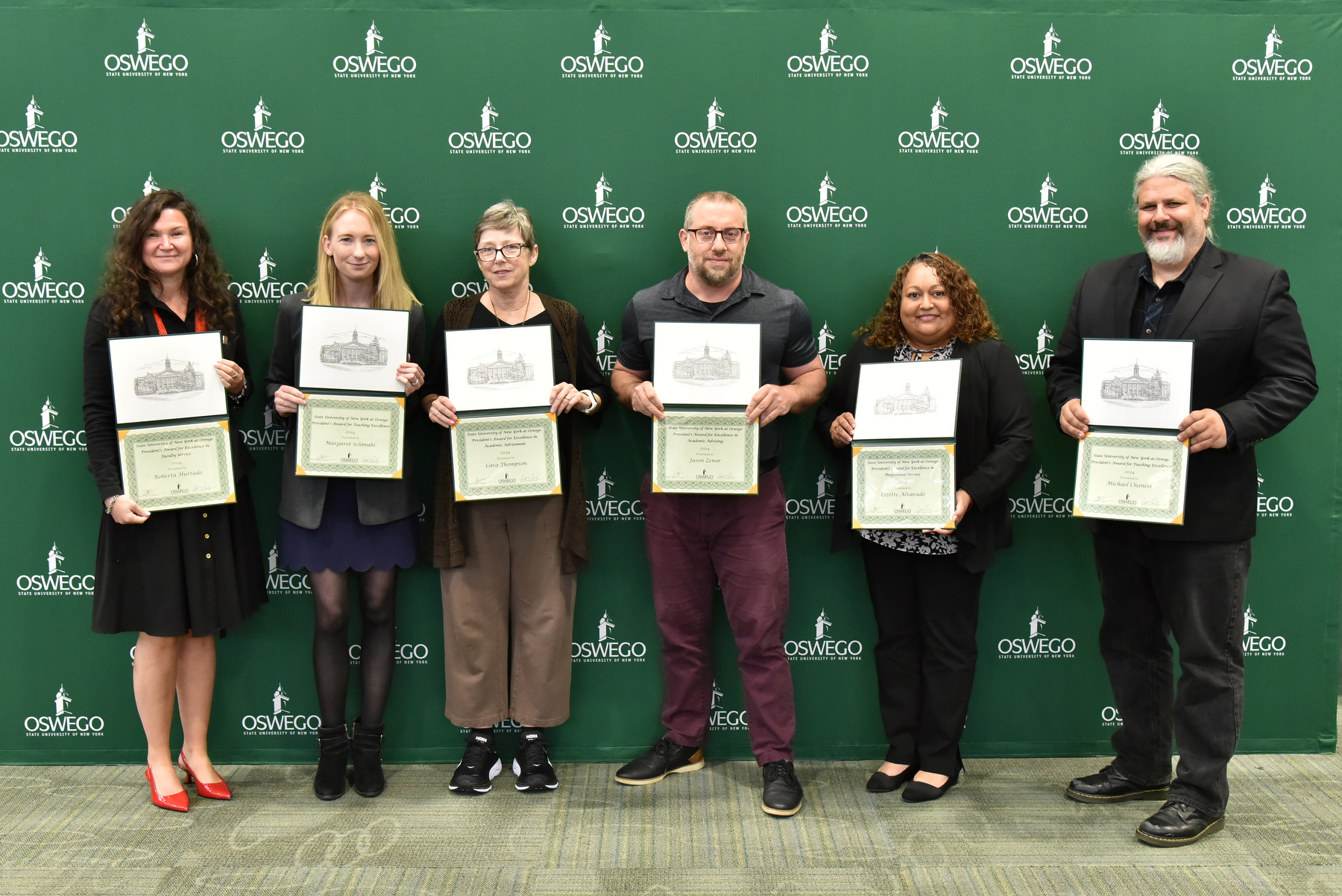 From left are Roberta Hurtado, President's Award for Excellence in Faculty Service; Margaret Schmuhl, President's Award for Excellence for Teaching Excellence; Cara Thompson, President's Award for Excellence in Academic Advisement; Jason Zenor, President's Award for Excellence in Academic Advisement; Lizette Alvarado, President's Award for Excellence in Professional Service; and Michael Chaness, President's Award for Excellence for Teaching Excellence.