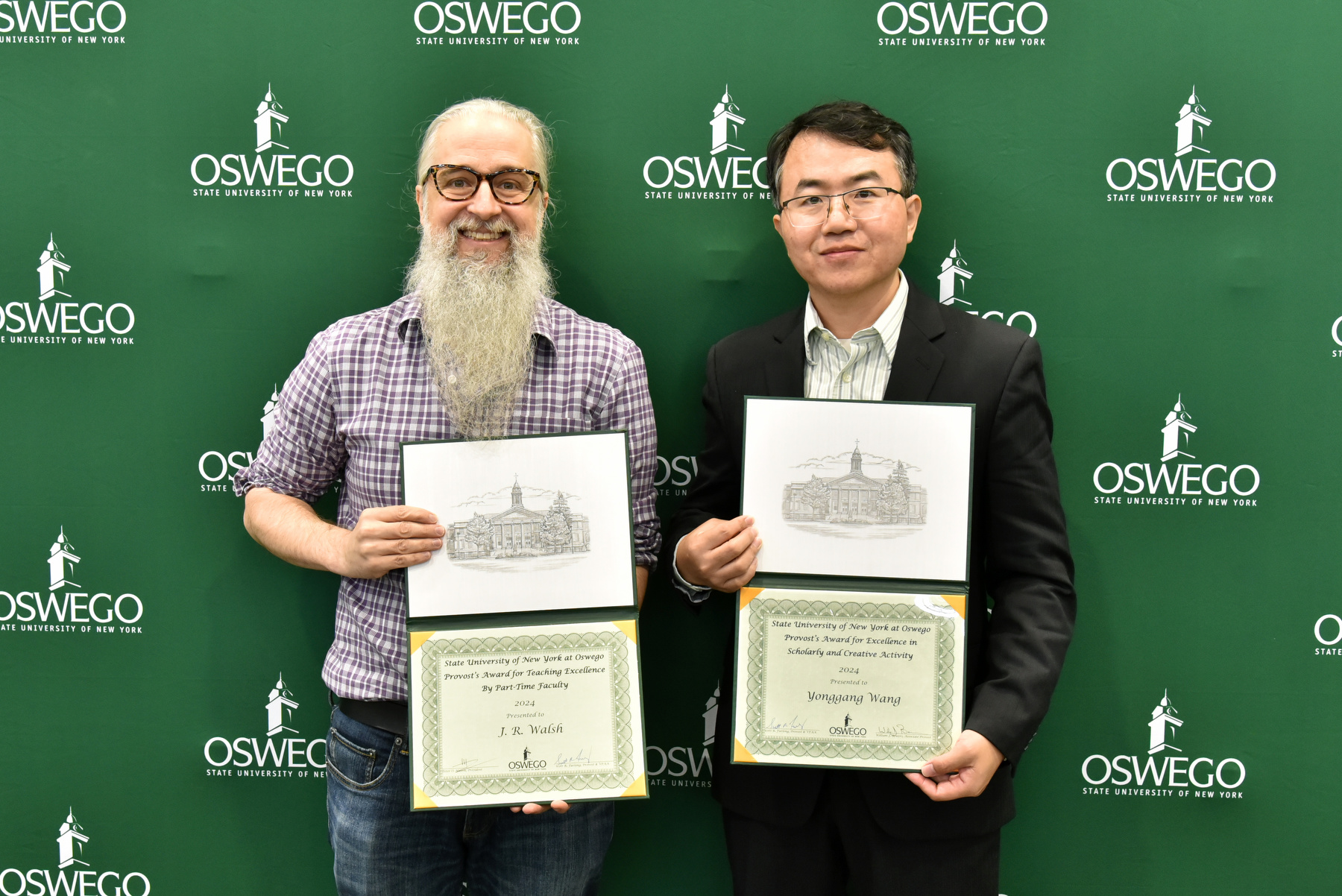 Those recognized during the Academic Affairs Retreat on Aug. 20 included, from left, J.R. Walsh, Provost's Award for Excellence for Teaching Excellence by Part Time Faculty; and Yonggang Wang, Provost's Award for Excellence for Teaching Excellence in Scholarly and Creative Activity.