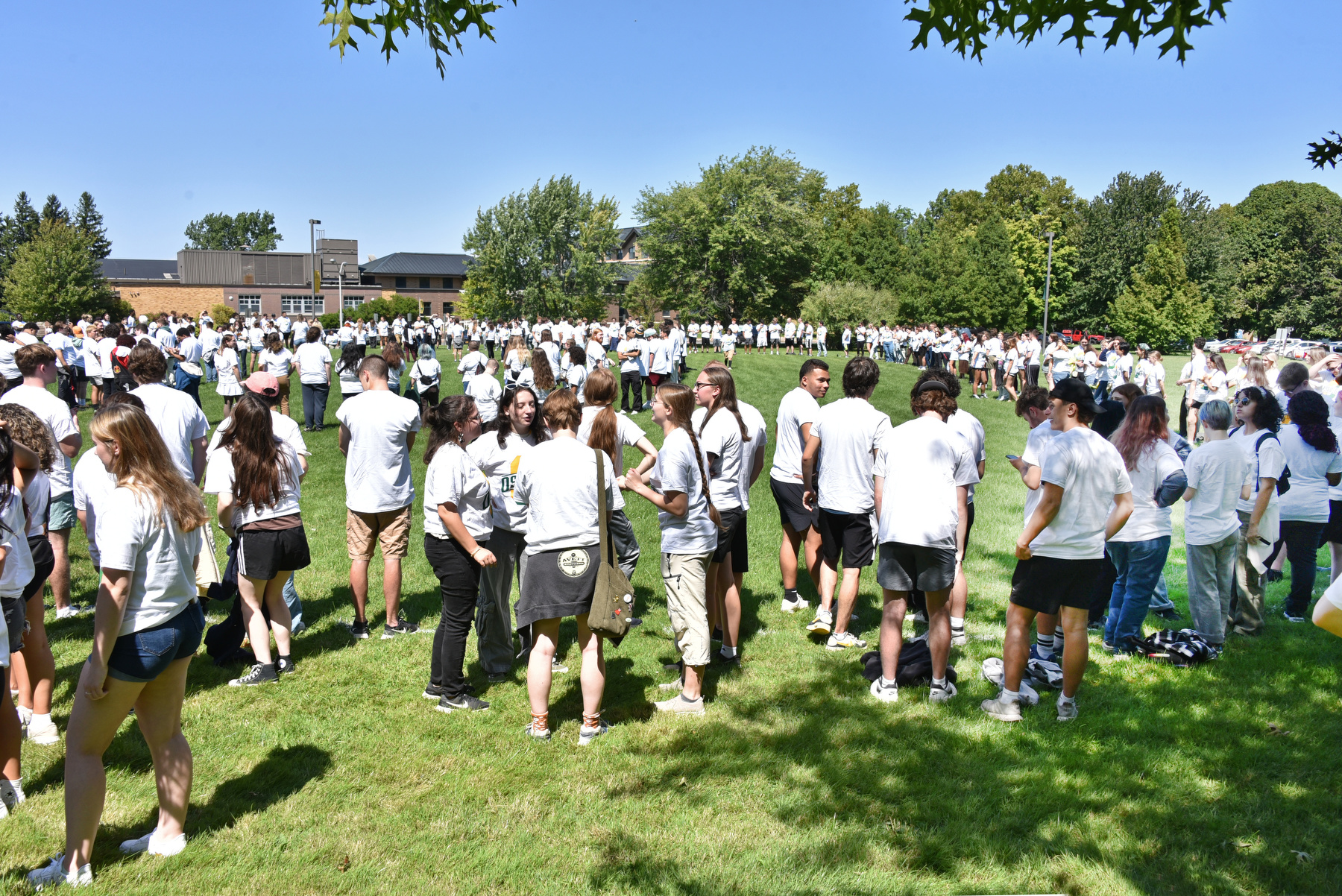 A feeling of excitement and teamwork was in the air as new students, as well as faculty and staff helpers, gathered for the annual "O" photo on Lee Hall field.