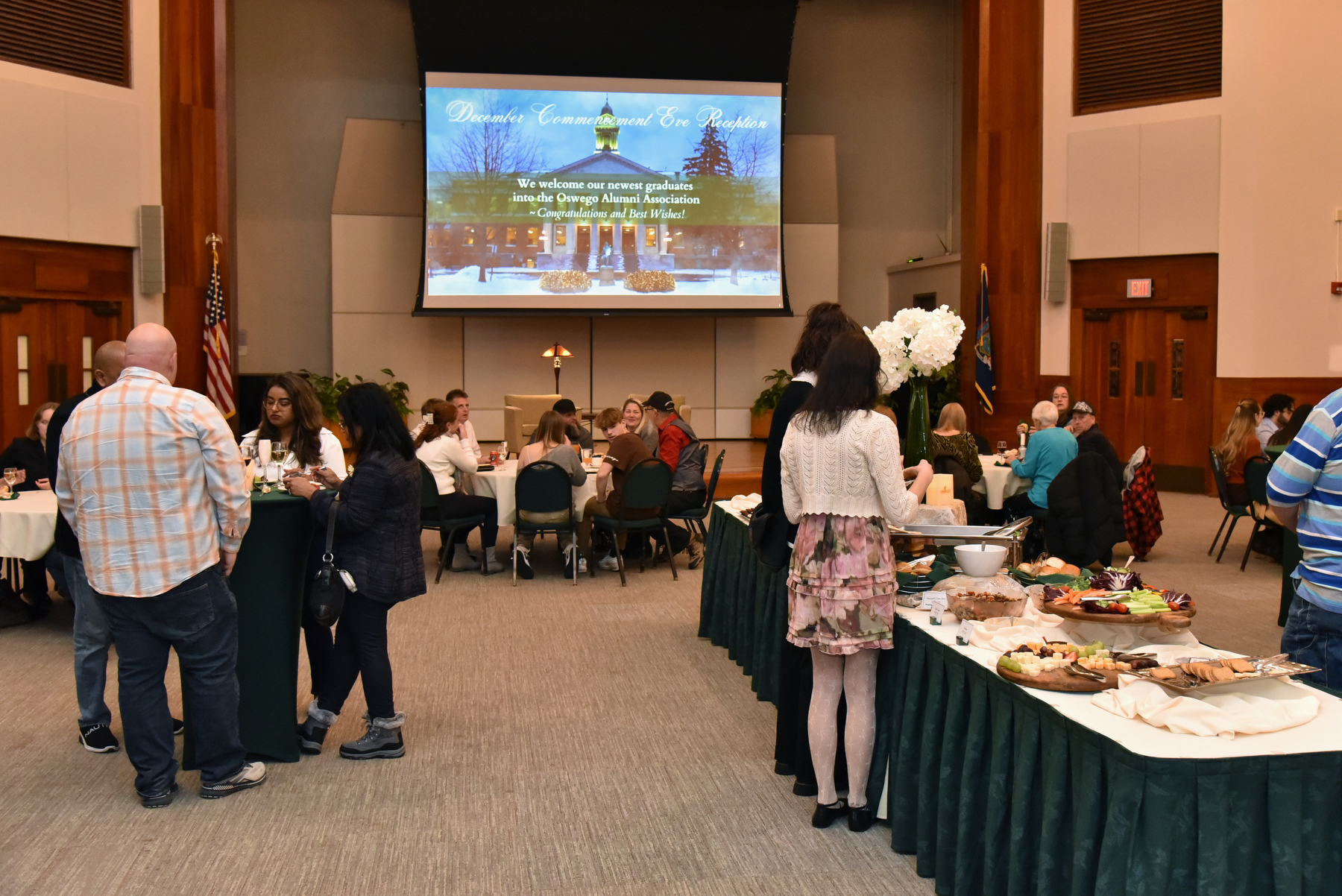 The December Commencement Eve Reception welcomes graduates and their families in a relaxed atmosphere in Sheldon Hall Ballroom. The Dec. 13 event is hosted by the Oswego Alumni Association.